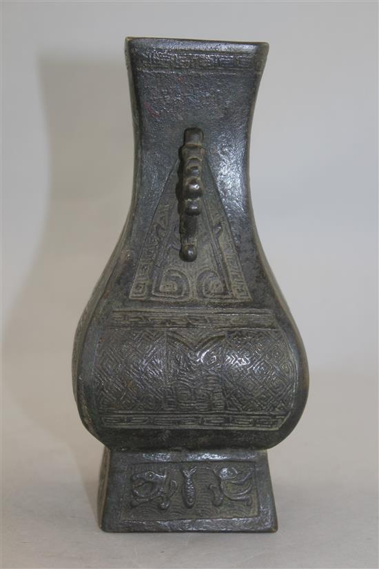 A Chinese square baluster two handled vase, Fanghu, probably Ming dynasty, 18.5cm